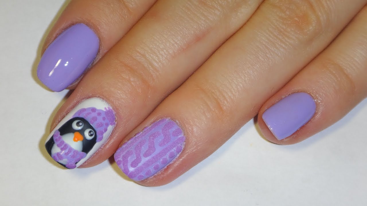 Fantastisk pingvin på långfingret vyazanyj-manikyur-foto_4